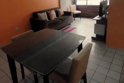 Image de Apartamento completo a uma quadra da praia, localização próximo ao comércio.