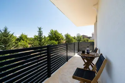 Image de Appartement de deux chambres avec la terrasse et la vue sur le mer Vir - Lozice, Vir (A-24328-b)