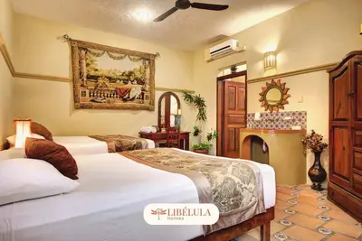 Image de Quadruple Room • 2' Walk to the Beach and 5th Av