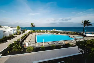 Image de Maison de Vacances 'Caleta Campos 2' avec Vue sur la Mer, Piscine Partagée et Wi-Fi
