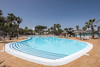 Image de Home2Book Charming Apt Poolside Retreat