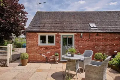 Image de The Retreat is a carefully transformed barn offering elegant and comfortable accommodation in the charming village of Hollington, close to Ashbourne and just a ten-minute drive from the Peak District.