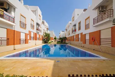 Image de Appartement 'Quinta Da Gomeira 63' avec piscine partagée, jardin commun et climatisation