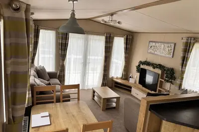 Image de \nAisling comprises a large kitchen diner with lounge and 3 sizeable bedrooms.