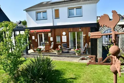 Image de Maison de vacances 'Fuchsbau Voßwinkel' avec terrasse privée, jardin et Wi-Fi