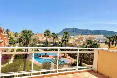 Image de Duplex lumineux avec piscine et parking à Denia