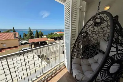 Image de Appartement de vacances Chambre familiale moderne avec vue sur la mer