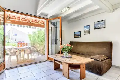 Image de Vacation home 150 m from the beach. 2 bedrooms, 2 air conditioning units, terrace