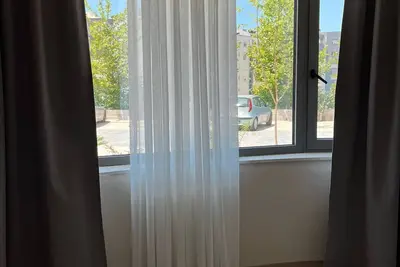 Image de 5-minutes to the sea! One-bedroom Apartment with Garden View Balcony