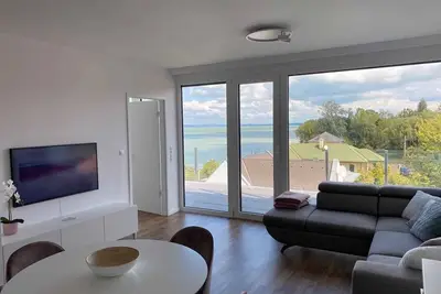 Image de Appartement de vacances directement sur la rive avec sa propre plage