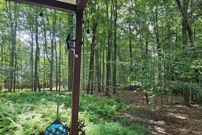 Image de Lovely 4-bedroom house hot tub, fire place, fire pit for a relaxing getaway