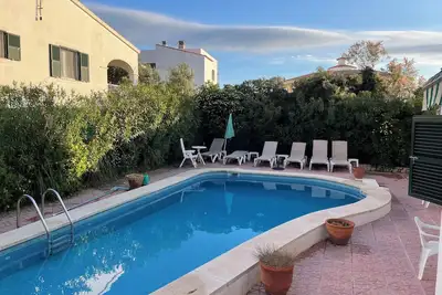 Image de 3 bedroom apartment with swimming pool in Addaia