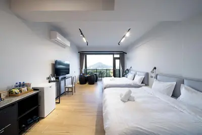 Image de Modern Family Room with Balcony & Mountain View – See You Soon Homestay, Alishan