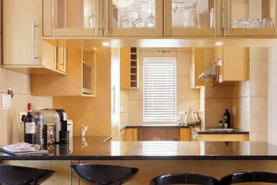 Image de Strand Beachfront Home with Panoramic Ocean Views