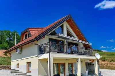 Image de Plivanje u zalazak sunca - Three Bedroom House