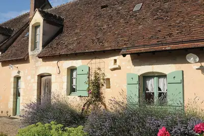 Image de Maison pleine de charme. Salon chaleureux. 2 chambres cocooning. Cuisine d'été