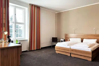 Image de Multi-bed room 106 - Ibs Meeting Center