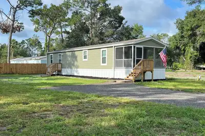 Image de New Home. Perfect for Travelers, Snow-Birds, Bikers, Boaters & Fishermen.