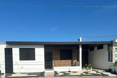 Image de Escape to Blissful Homes, where modern bohemian charm meets ultimate relaxation.