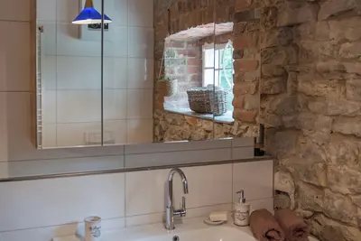 Image de Old Forestry Office in the Teutoburg Forest Holiday apartment Kutscherstube