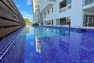 Image de Apt+WiFi+Parking+Ac+Near The Beach+Tv @BocaChica 2 Min walk to the Beach