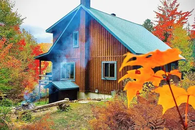 Image de Chalet L'Âtre ~Lac et Spa, 10 min. Ski Val St-Côme~