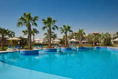 Image de Golf Courses & Poolside Views | Two Rooms, Private Beach & Kids Playground