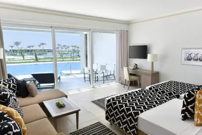 Image de Peaceful Red Sea Getaway | 3 Swim-Up Rooms, 5 Pools, Dining & Reef Adventures