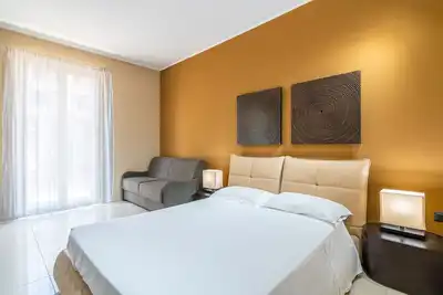 Image de Chambre 'Nick Mason - Quadrupla Superior' avec jardin commun, Wi-Fi et climatisation