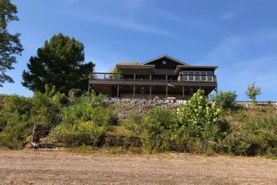 Image de T&E Riverhouse Retreat