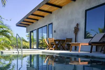 Image de Relaxing lagoonfront villa with private pool, dock, café & on-site spa