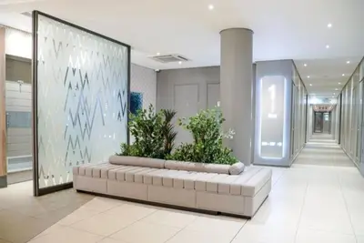 Image de located within Sandton 2 min from Nelson Mandela square and sandton city.