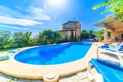 Image de Villa en pierre à Búger avec piscine privée