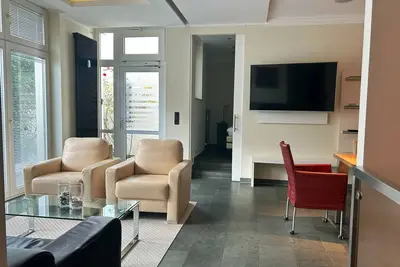 Image de Exclusive 4-room vacation apartment with terrace & sauna in the city center!