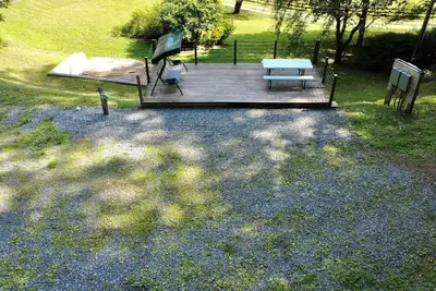 Image de The Cove Site 1 – Full Hookups & Deck