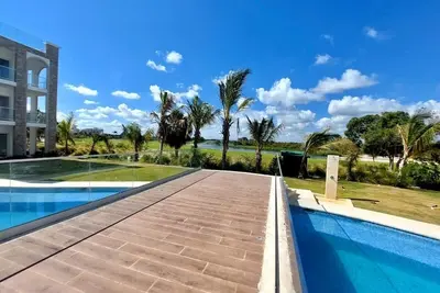 Image de Comfortable 1bdr in Cana Pearl with Lake/Golf View