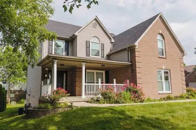 Image de Spacious 5-bedroom house with fitness room in charming Lexington