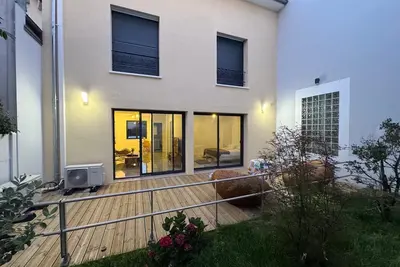 Image de Logement moderne & cosy avec terrasse privée