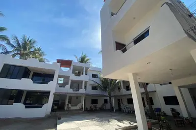 Image de Costa Ayala suite 2 with 2 dbl bed and 3 sofas, all basics, 2 blocks from beach