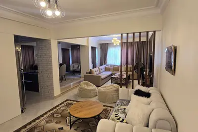 Image de Nasrcity Homestay offers a spacious two-bedroom apartment.