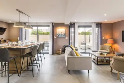 Image de Maison confortable avec jardin clos, sauna et babyfoot à Granville