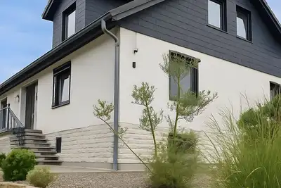 Image de Appartement 'Am Wäldchen' avec terrasse commune, jardin commun et Wi-Fi