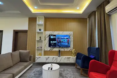 Image de 2-bedroom apartment in Abuja with Ac, WIfI, Ps5, Pool nightlife & relaxation