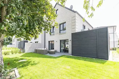 Image de Maison de vacances 'Das Strandhaus 2' avec terrasse partagée et Wi-Fi