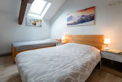 Image de Chambre 'Les Carlines 5' avec vue sur la montagne, terrasse partagée et Wi-Fi