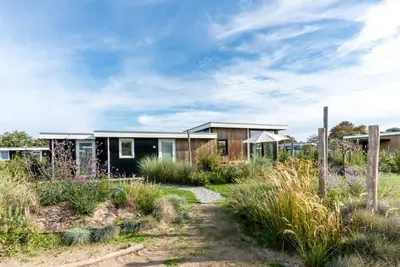 Image de Les influences scandinaves et zélandaises confèrent à ce chalet un style unique! Le magnifique jard