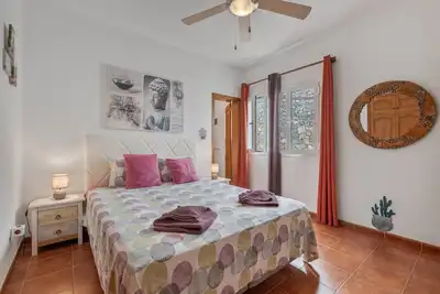Image de Suite de vacances « Vue sur la montagne » avec piscine commune, Wi-Fi et climatisation