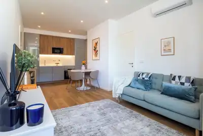 Image de Sleek & Modern Flat w/ Private Garage by HostWise