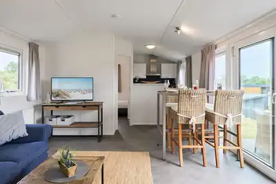 Image de Detached vacation home Seeleuchten with terrace on the lake in Seeparx Süsel