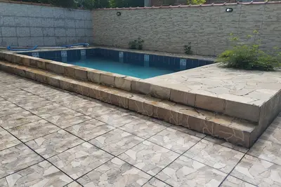 Image de House with pool and barbecue in front of Praia da Brisa